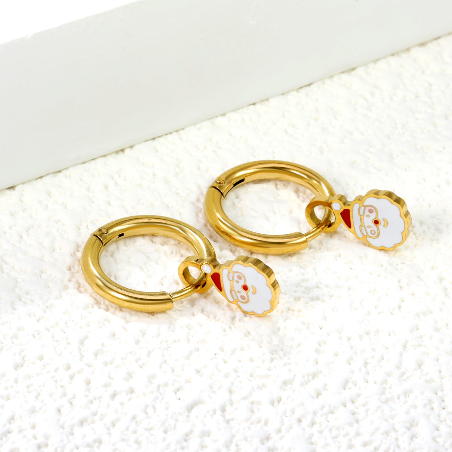 Gold Huggies with Santa Charm